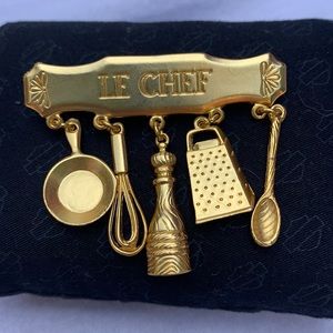 Pin with kitchen utensils hanging